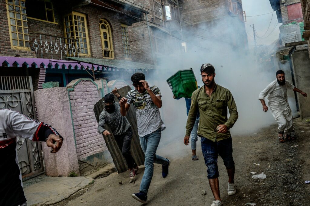 A protest outside Srinagar turned violent after the police fired tear gas on Aug. 16. This photo is by Atul Loke for NY Times