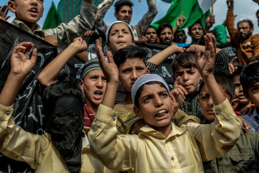 Children join a demonstration in Soura, Srinagar, on Sept. 20. Schools in Kashmir have been closed for weeks. Photo by Atul Loke for NY Times