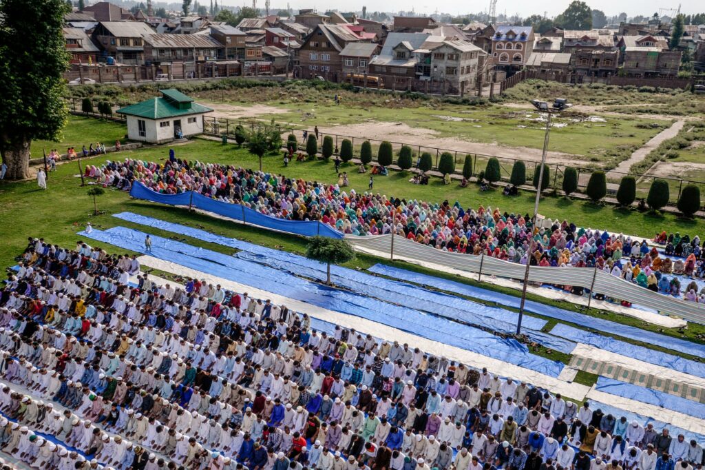 Gathering for Eid holiday prayers in Srinagar in August. Photo by Atul Loke for NY Times