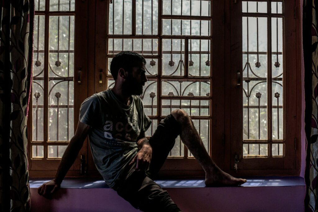 Idress Malik, 28, says he was detained and abused by the Indian Army in southern Kashmir's Shopian district last month. Photo by Atul Loke for NY Times