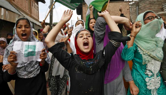 File image of Kashmiri girls shouting slogans in Srinagar in late September.