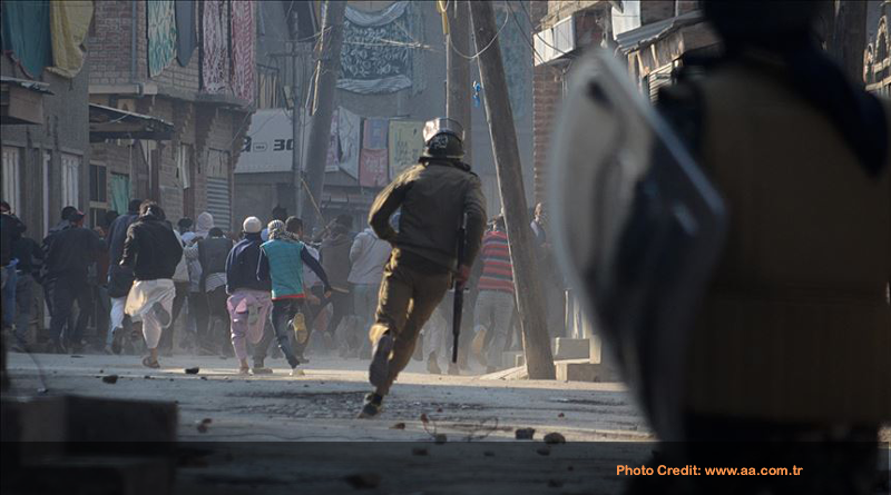 Kashmiri protesters run during clashes in Srinagar the summer capital of Indian controlled Kashmir