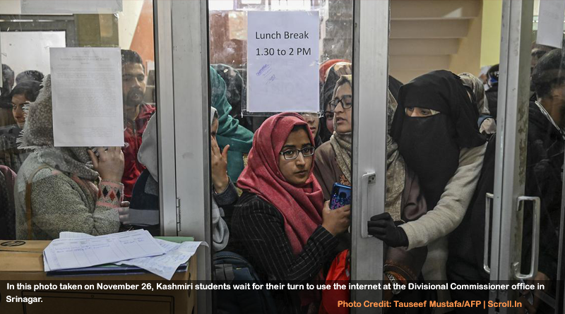 In this photo taken on November 26, Kashmiri students wait for their turn to use the internet at the Divisional Commissioner's office in Srinagar