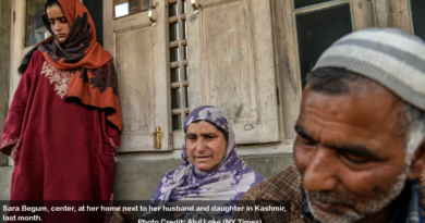 Sara Begum, center, at her home next to her husband and daughter in Kashmir, last month.